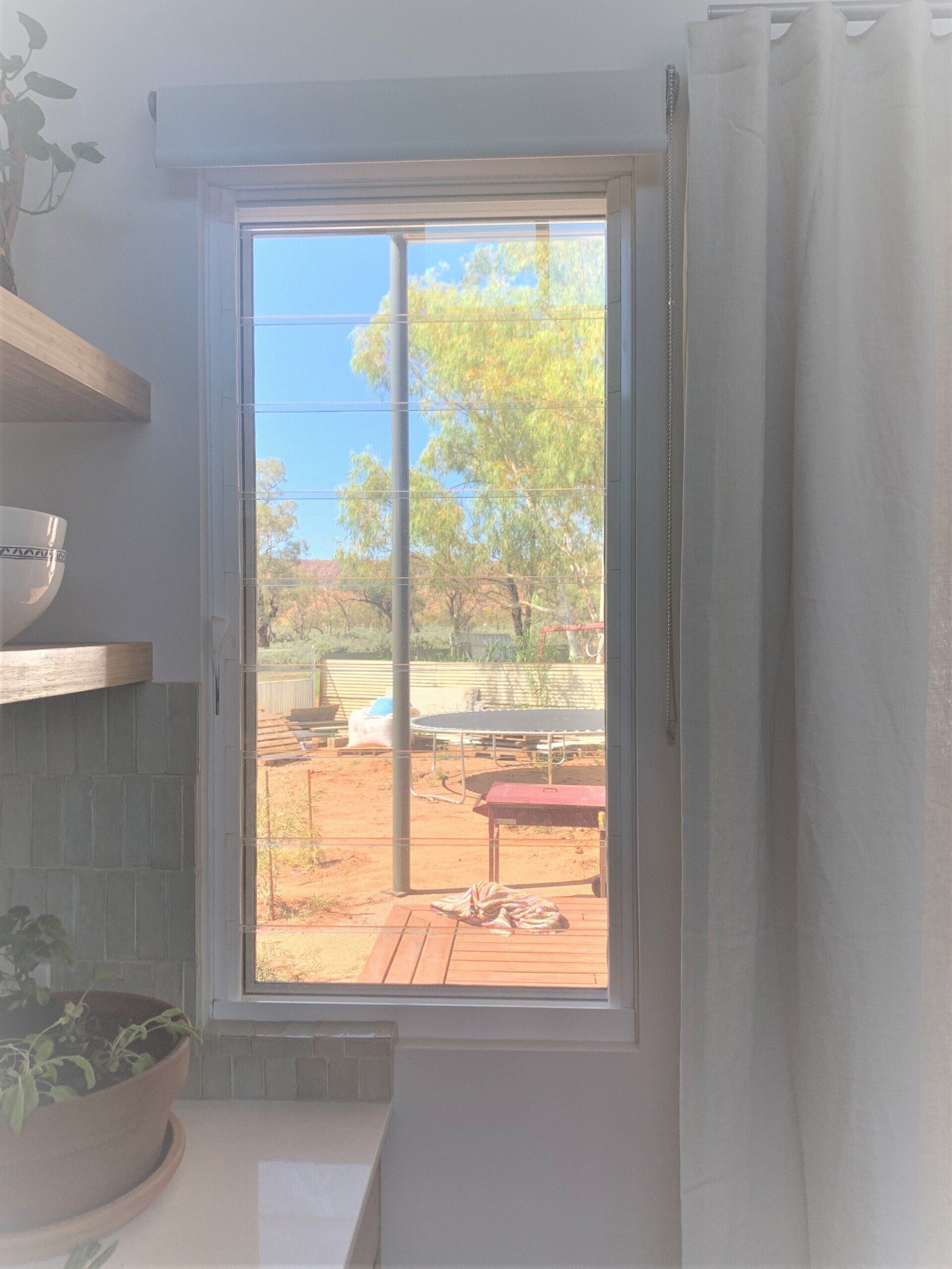 Roller Blind In The Bathroom — Blinds, Curtains And Shutters In Alice Springs, NT