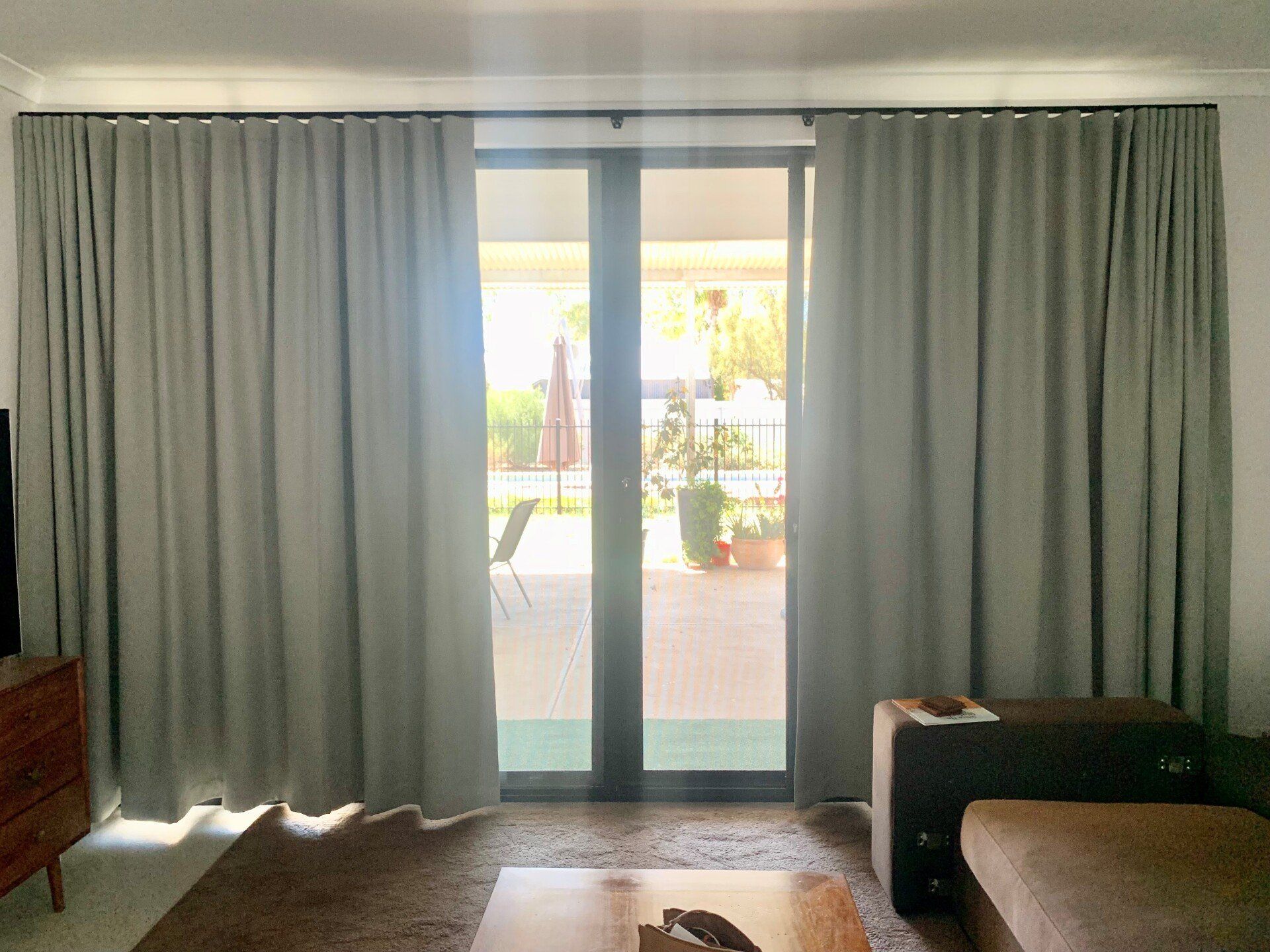 Partially Closed Curtains On Sliding Doors — Blinds, Curtains And Shutters In Alice Springs, NT