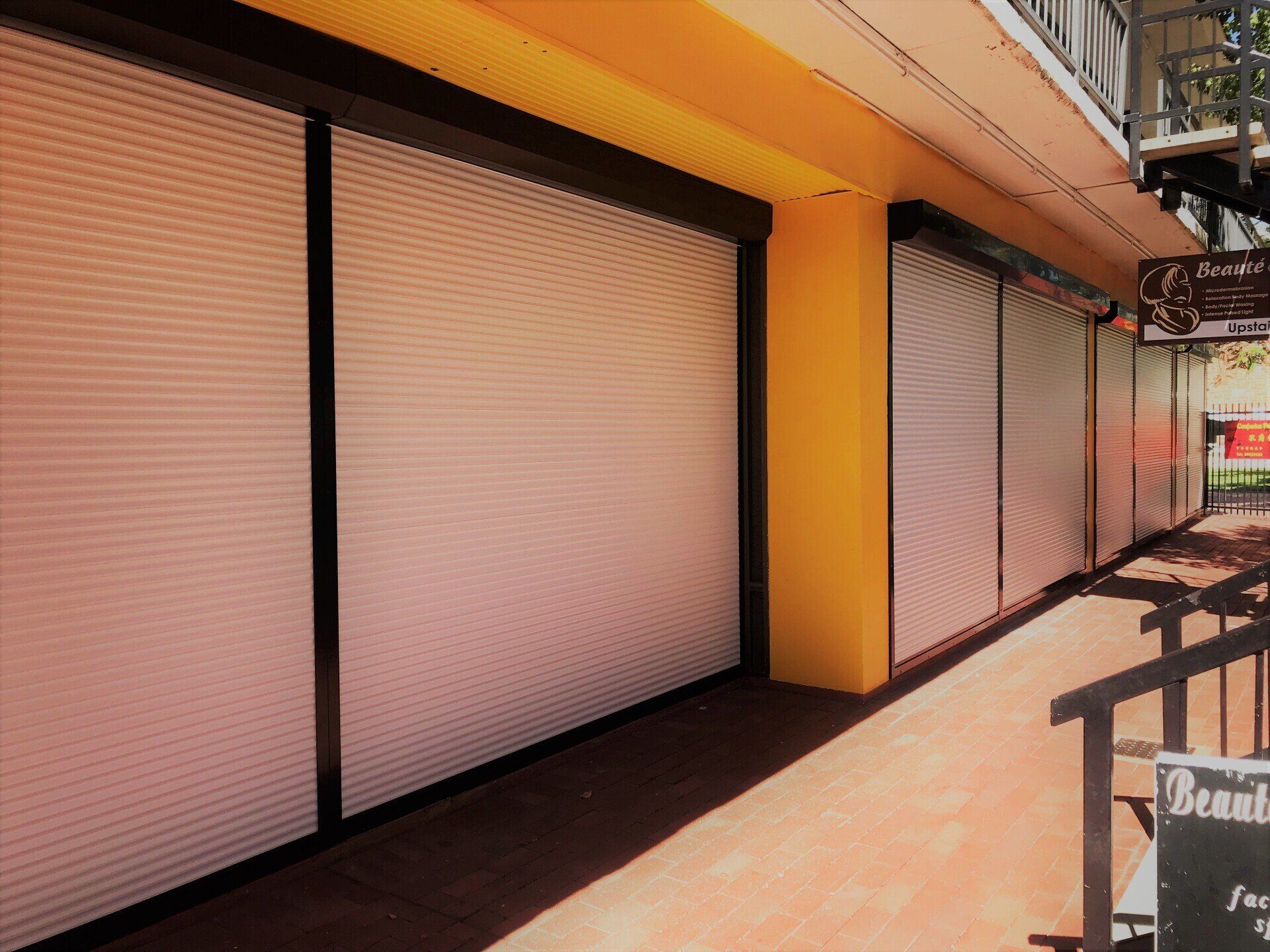 Large White Roller Doors — Blinds, Curtains And Shutters In Alice Springs, NT