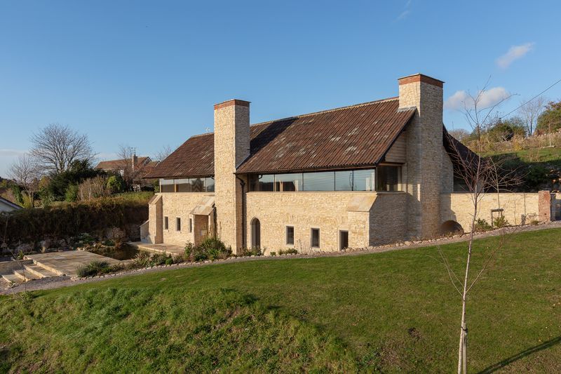 Coursed limestone cladding