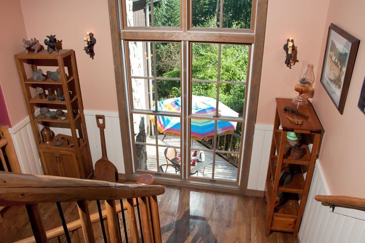 An aerial view of a living room with a large window
