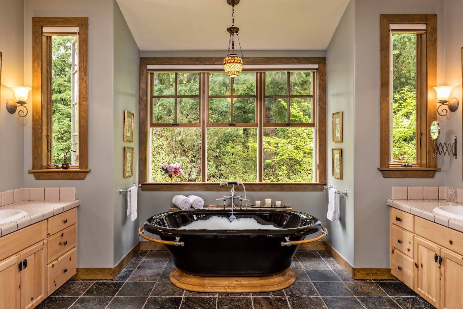 There is a large bathtub in the middle of the bathroom.