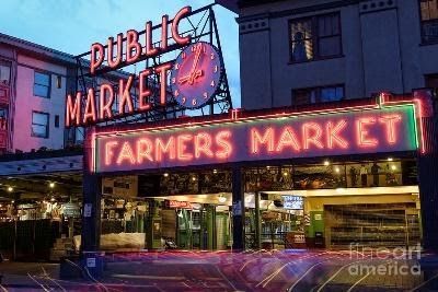 A neon sign for the public market and farmers market