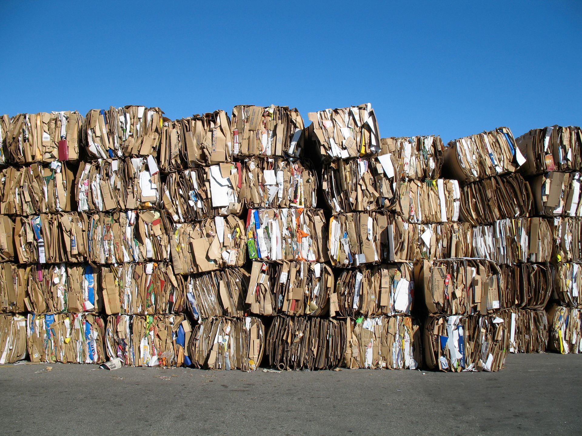 A large pile of cardboard blocks stacked on top of each other