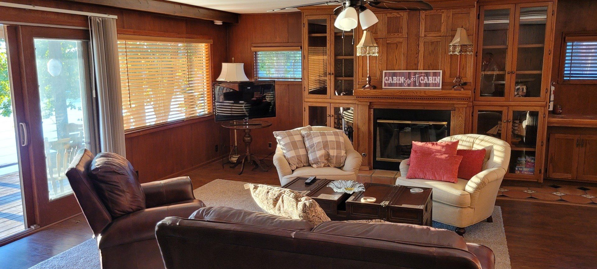 A living room filled with furniture and a fireplace.