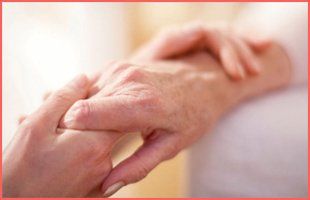 For an osteopath in Banbury, Oxford call Jerry Longland Osteopath holding hand