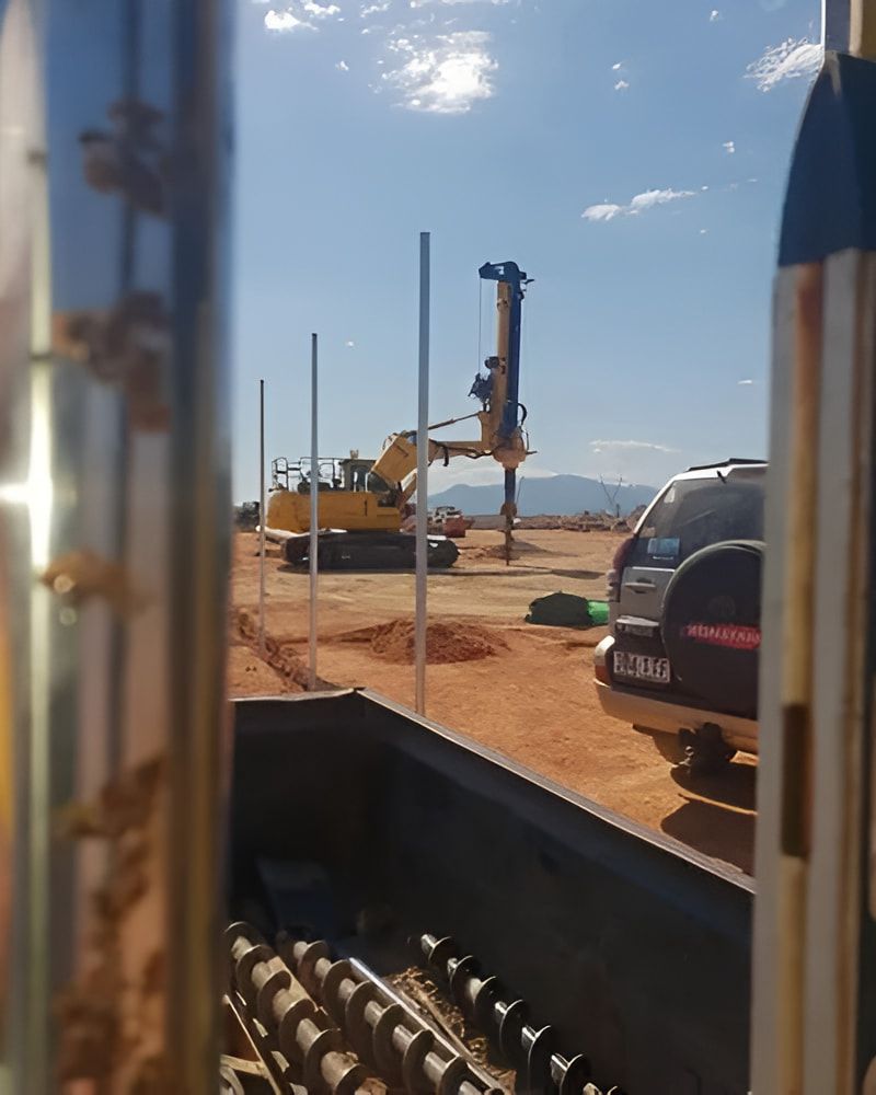 A Truck Is Parked In Front Of A Construction Site — PGI North QLD In Rosslea, QLD