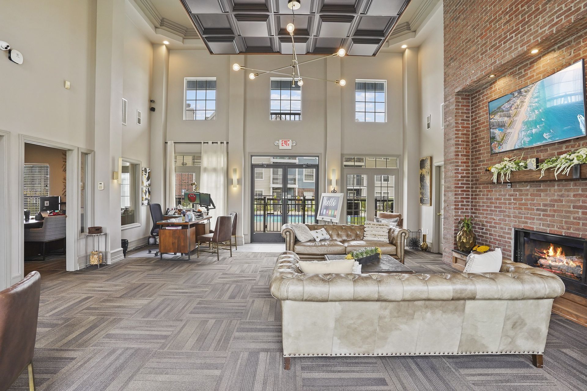 A large room with a fireplace and a couch.