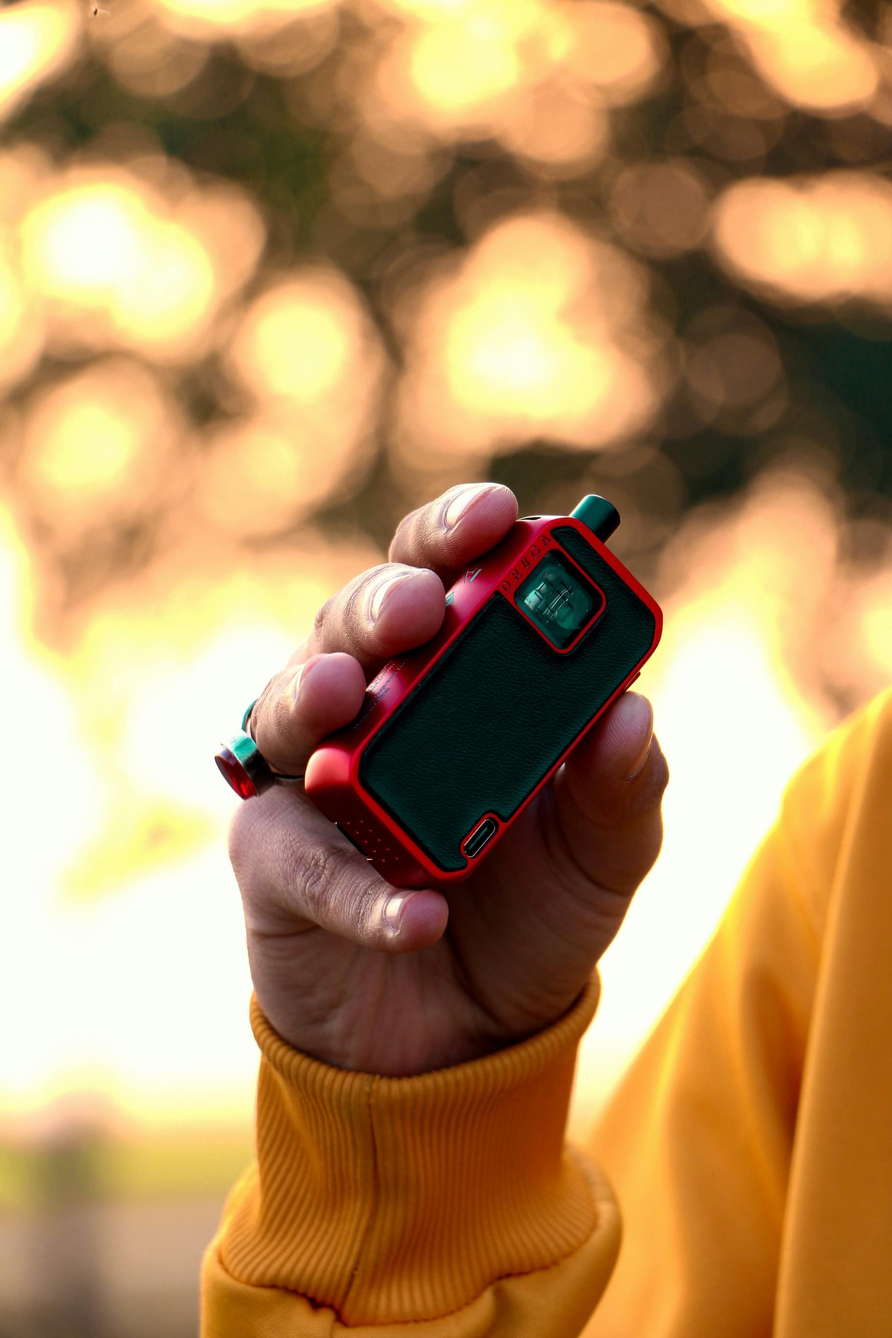 Guy Using Red Vape