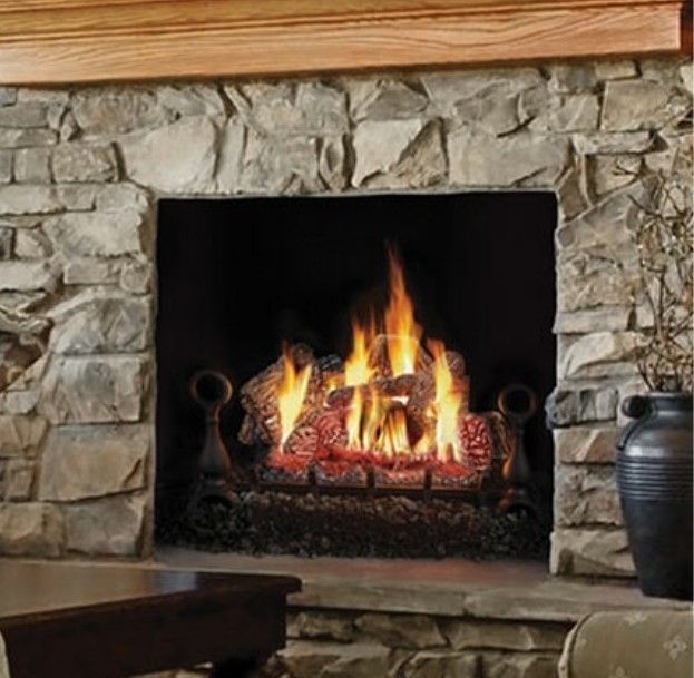 A fireplace with a lot of fire in it