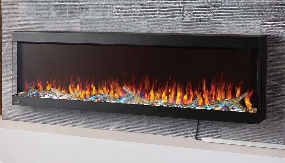 A fireplace is hanging on a wall in a living room.