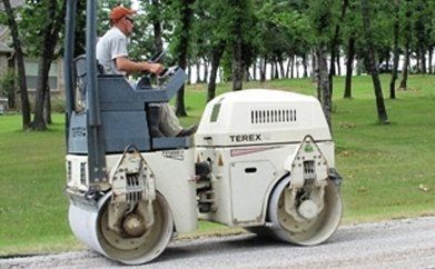 Spraying Water On The New Surface — Weatherford, TX — North American Paving