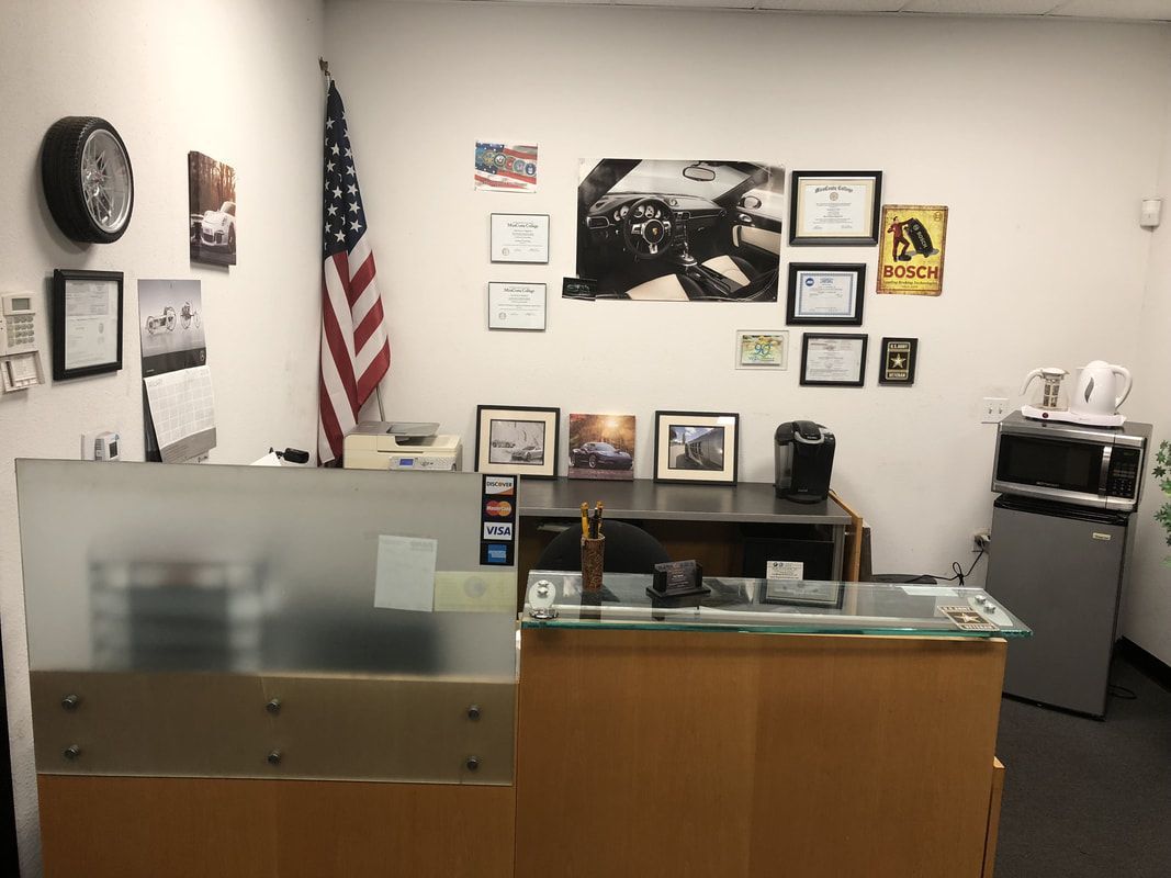 A reception area with an american flag on the wall