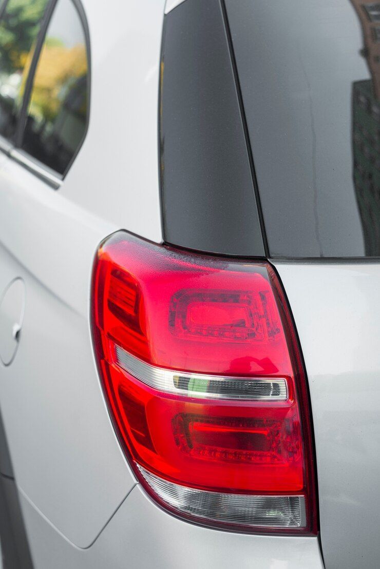 man repairing engine car