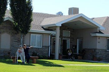 Nurse and senior woman outside the house - Assisted Living in Heber, UT Nurse and senior woman outside the house - Assisted Living in Heber, UT