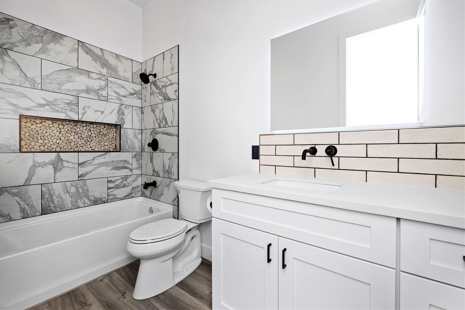 Luxurious bathroom in a custom cliffside home on Jordin Drive in Prescott, AZ, featuring modern fixtures, elegant finishes, and a spacious layout.
