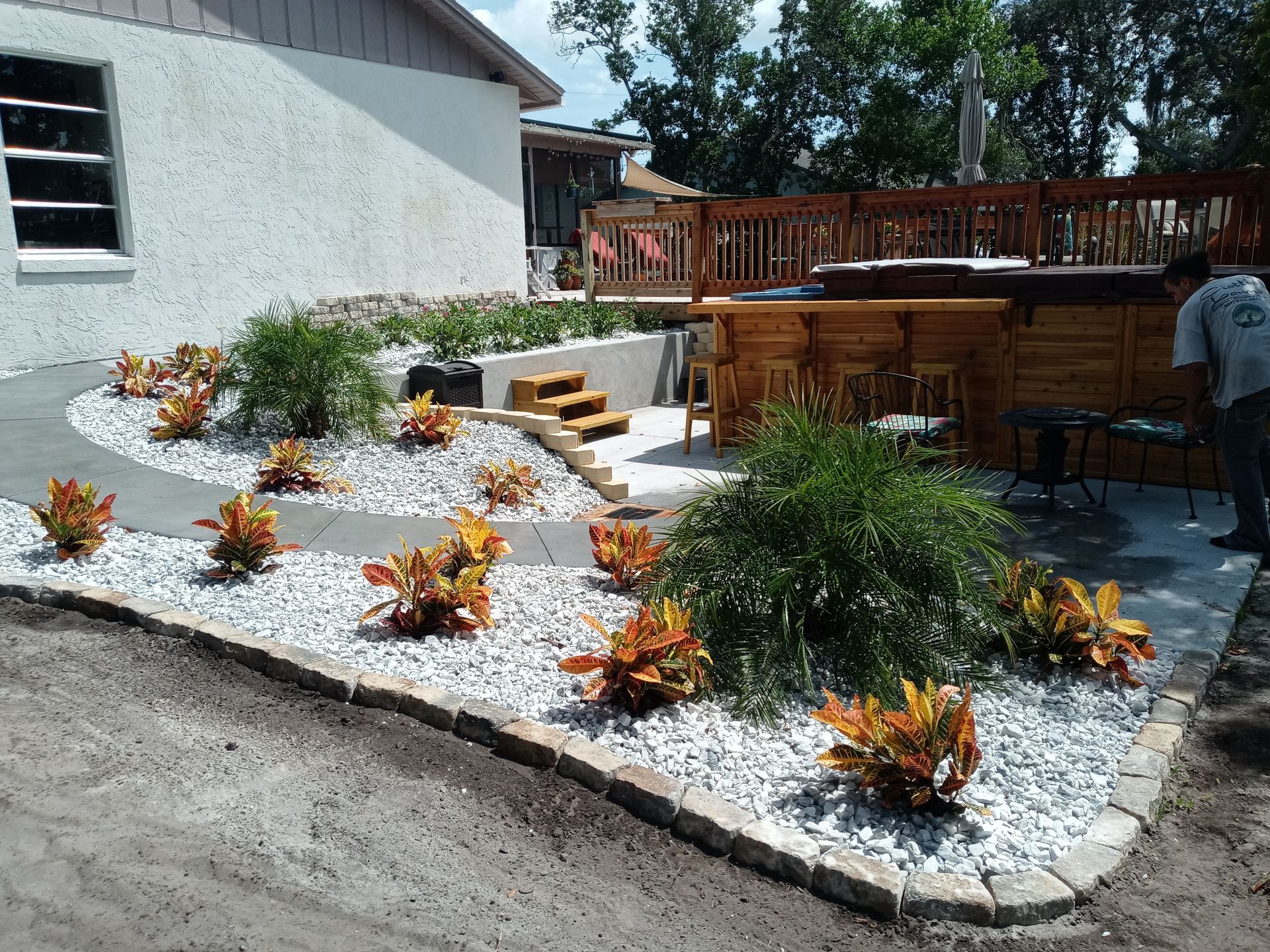 A set of stairs with lights on them in a garden.