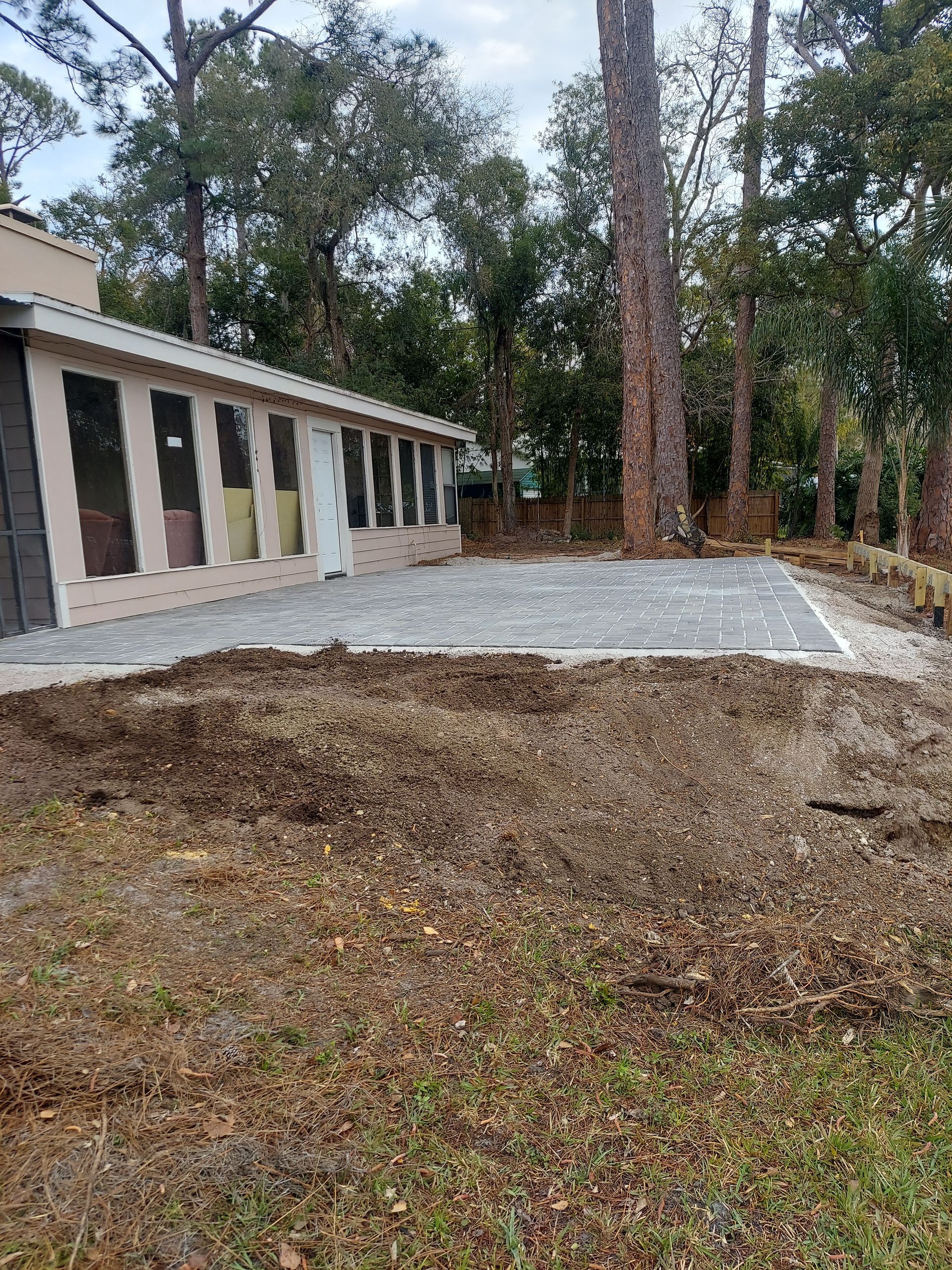 A house is being built in the middle of a forest.