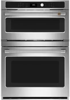 A stainless steel double oven with a microwave inside of it.