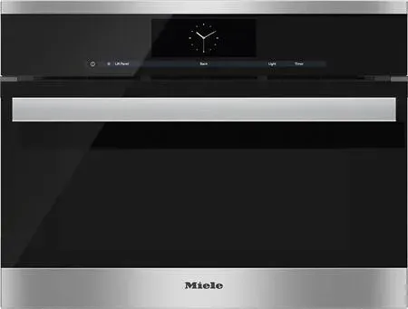 A stainless steel oven with a clock on the front