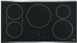 A stainless steel double oven with a black door