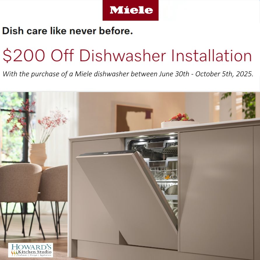 A kitchen with a stainless steel dishwasher and a free 5 year warranty.