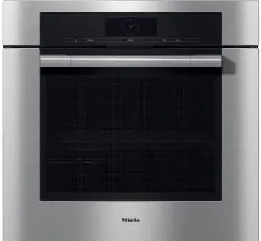 A stainless steel refrigerator freezer with a handle on a white background.