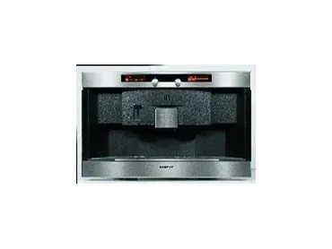 A stainless steel hood is hanging on a tiled wall.