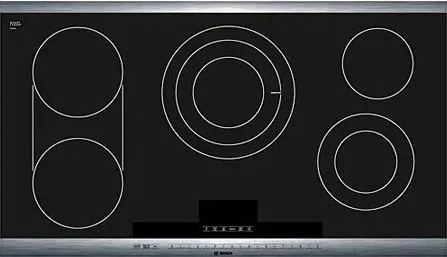A stainless steel double oven with a black door