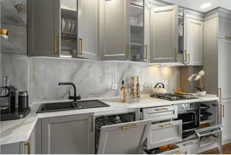 A kitchen with a large island and stools