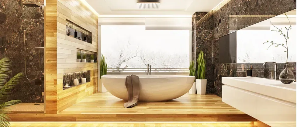 A bathroom with a large bathtub and a sink.
