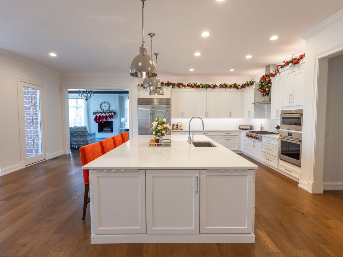 There is a large island in the middle of the kitchen.