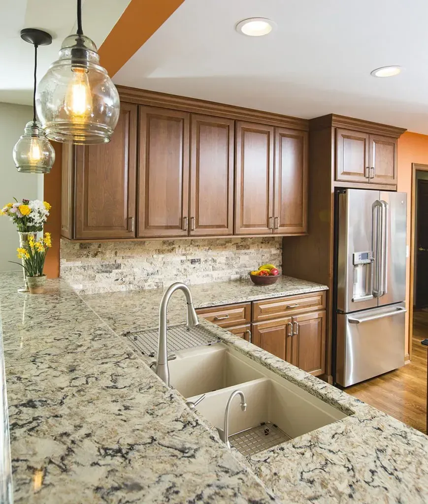 A kitchen with stainless steel appliances and granite counter tops