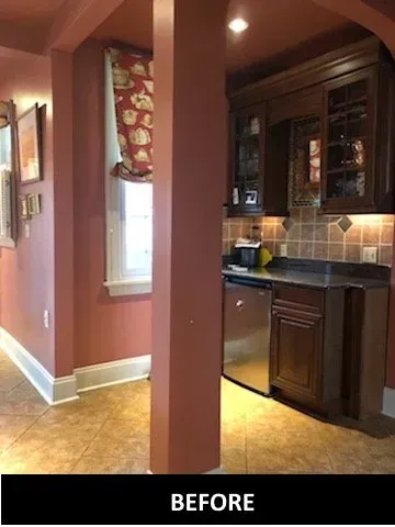 A before picture of a kitchen with stainless steel appliances