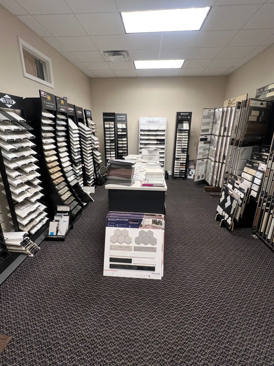 A large room filled with lots of displays and a table.