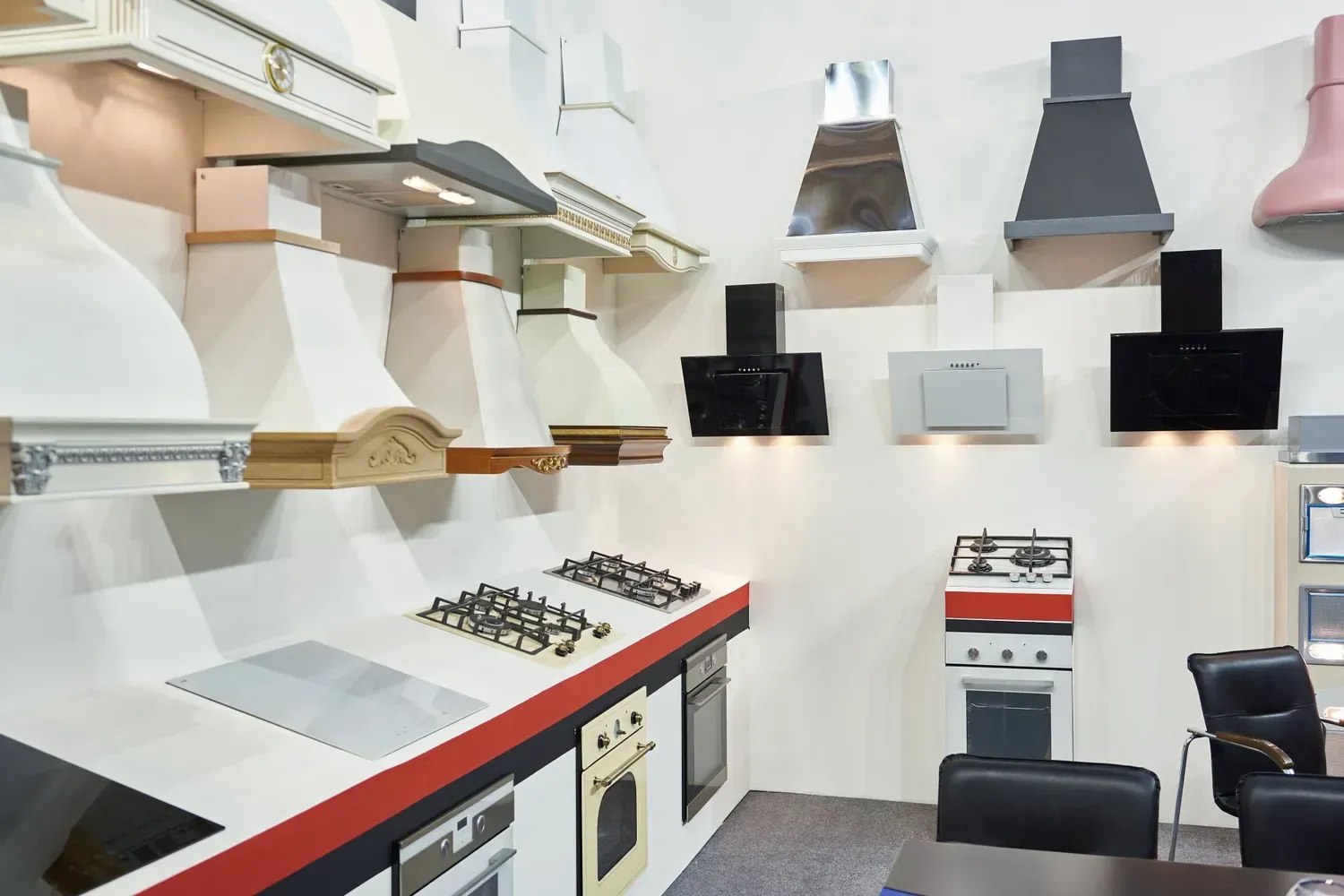 A kitchen with a large island and stools
