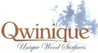 A logo for qwinique unique wood surfaces.