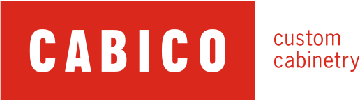A red and white logo for cabico custom cabinetry