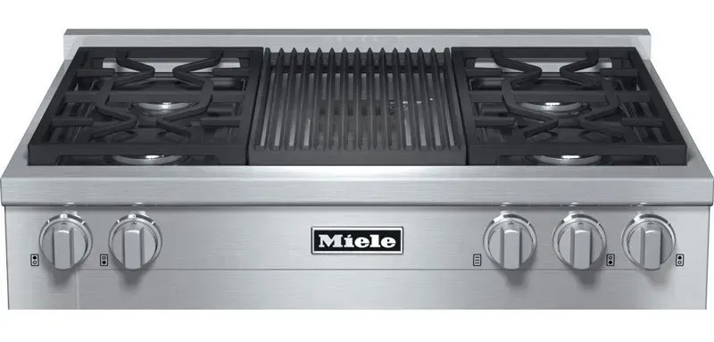 A stainless steel double oven with a microwave inside of it.