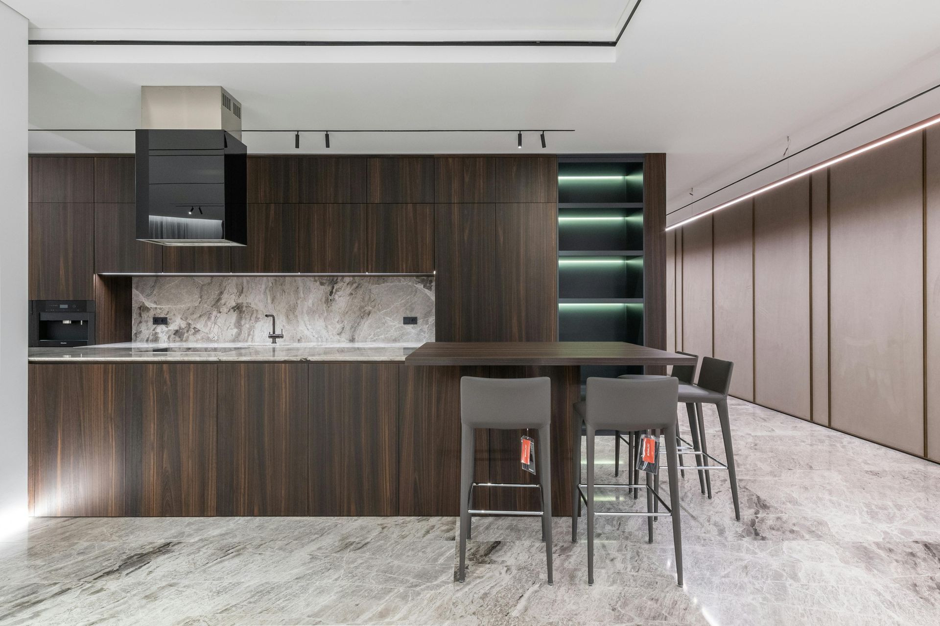 A kitchen with white cabinets and granite counter tops