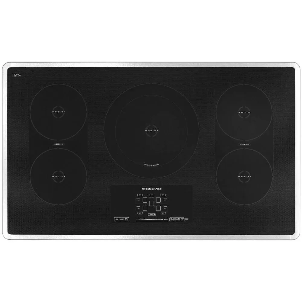 A stainless steel double oven with a microwave inside of it.