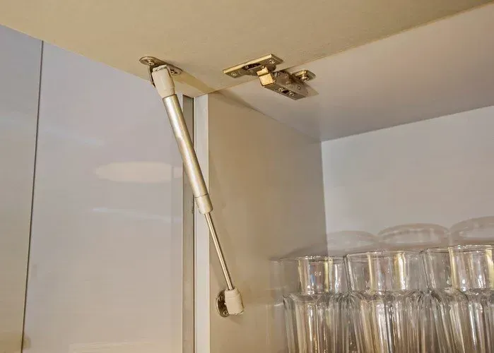 A close up of a gas lift in a cabinet