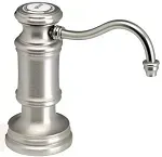 A stainless steel soap dispenser with a curved handle on a white background.