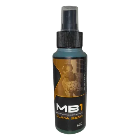 Botella de producto en spray MB1 MAX con bomba negra, líquido marrón y etiqueta.