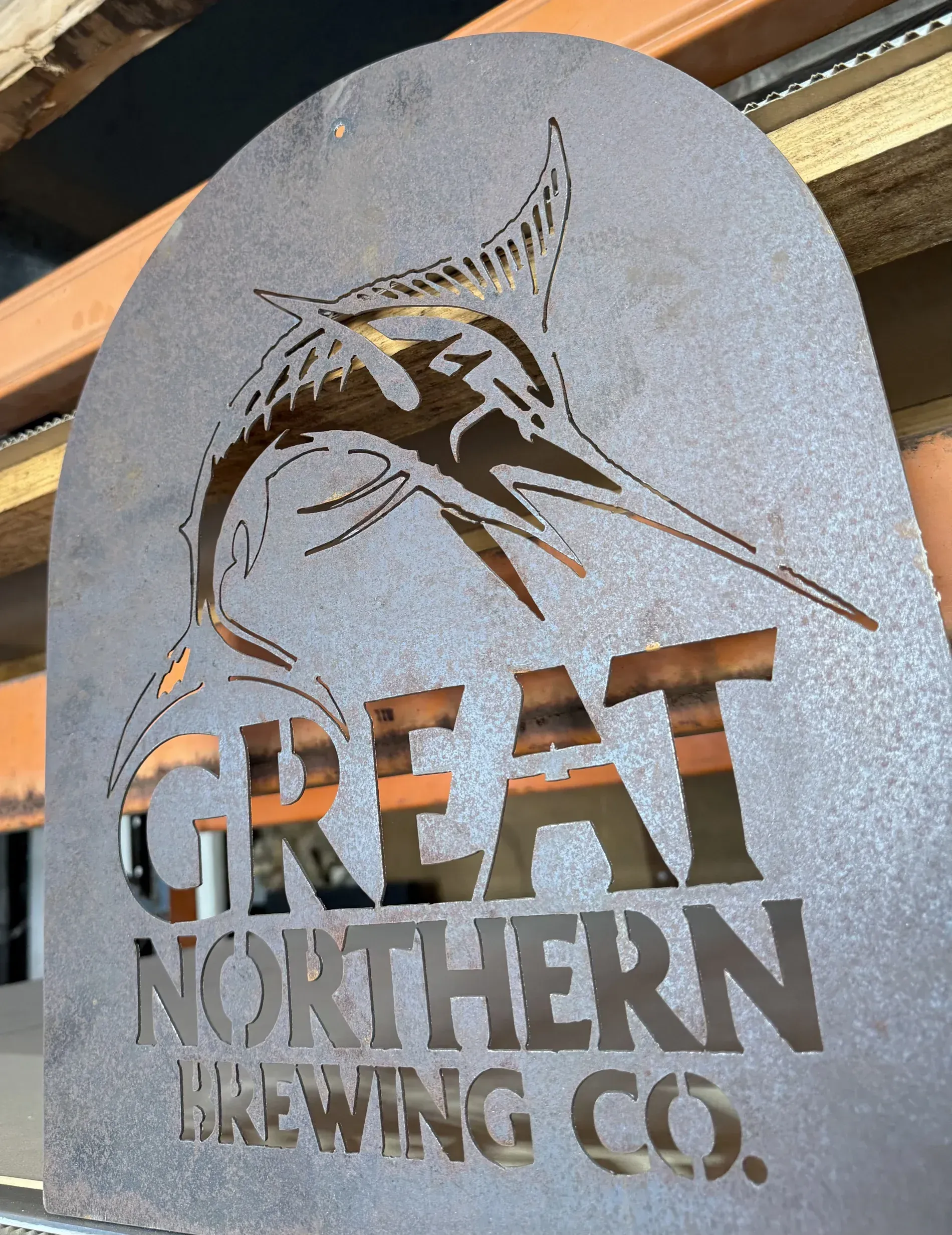 Metal sign with a Marlin and