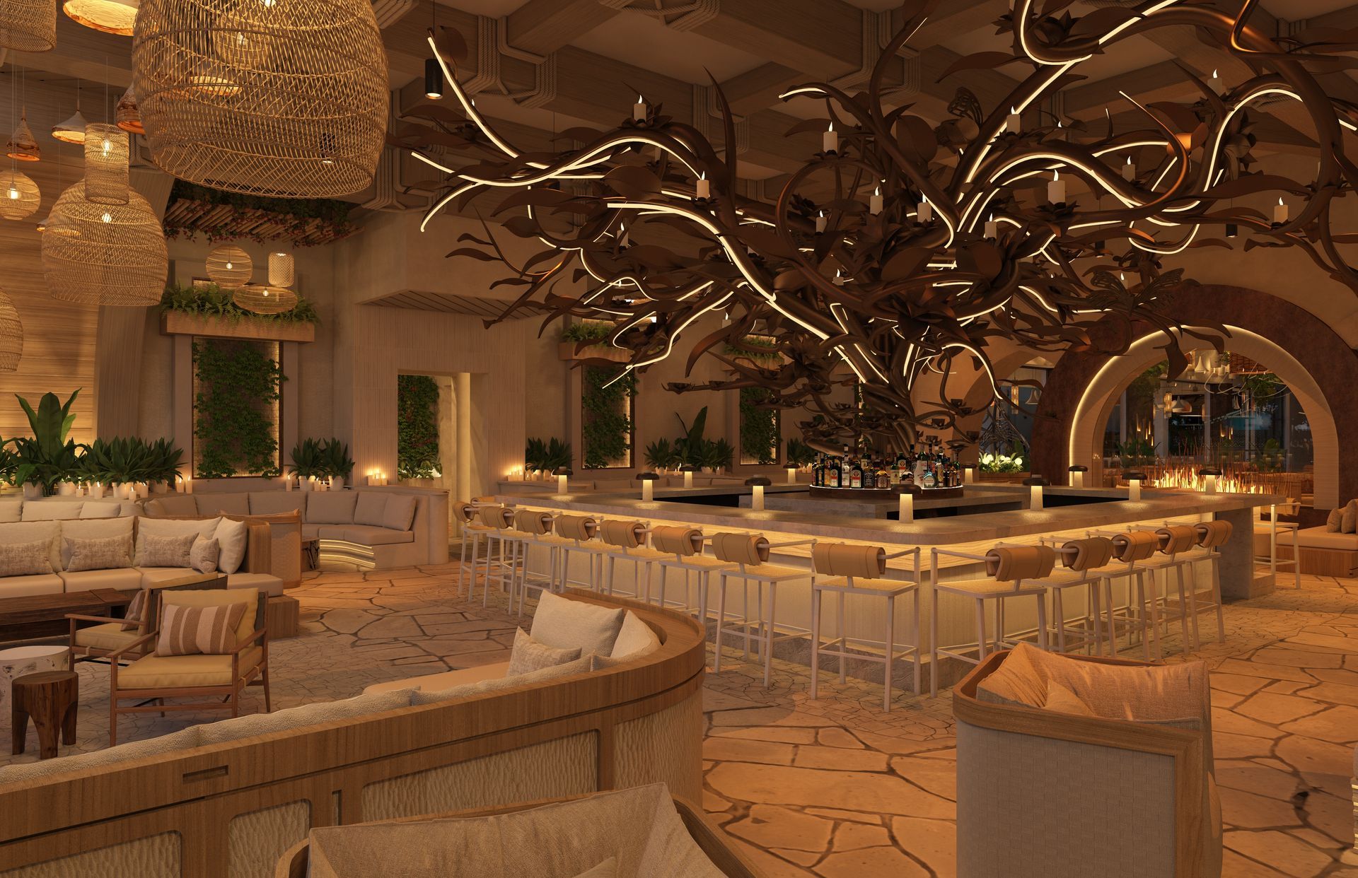 A large room with a bar and a tree in the ceiling.