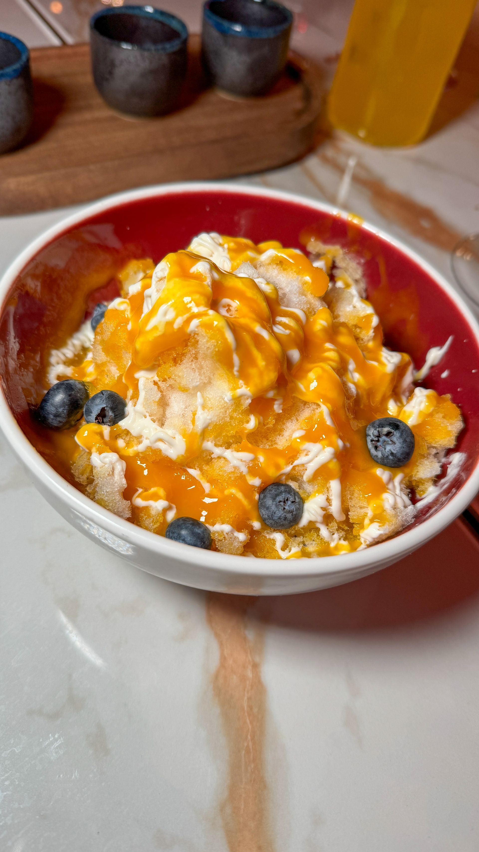 A close up of a bowl of food on a table.
