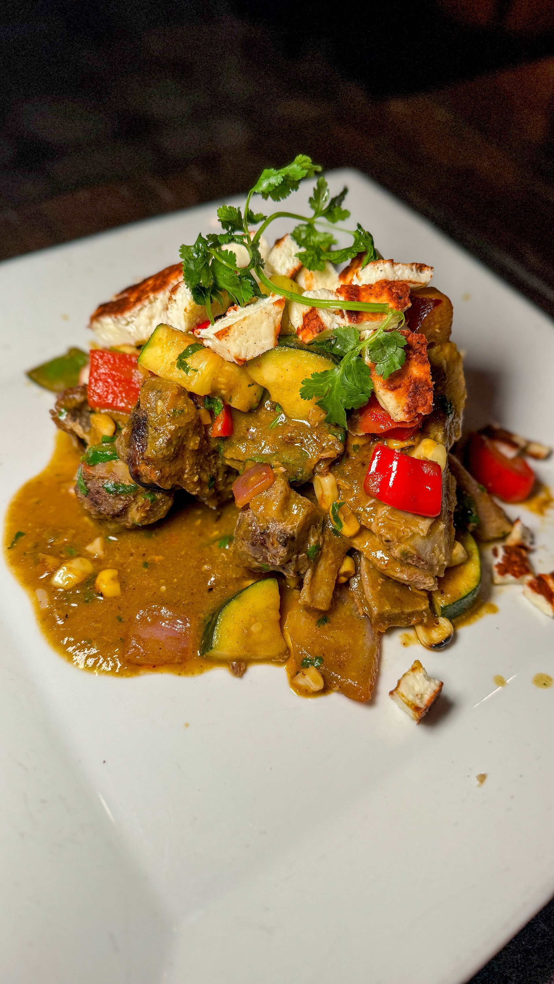 A close up of a plate of food on a table.