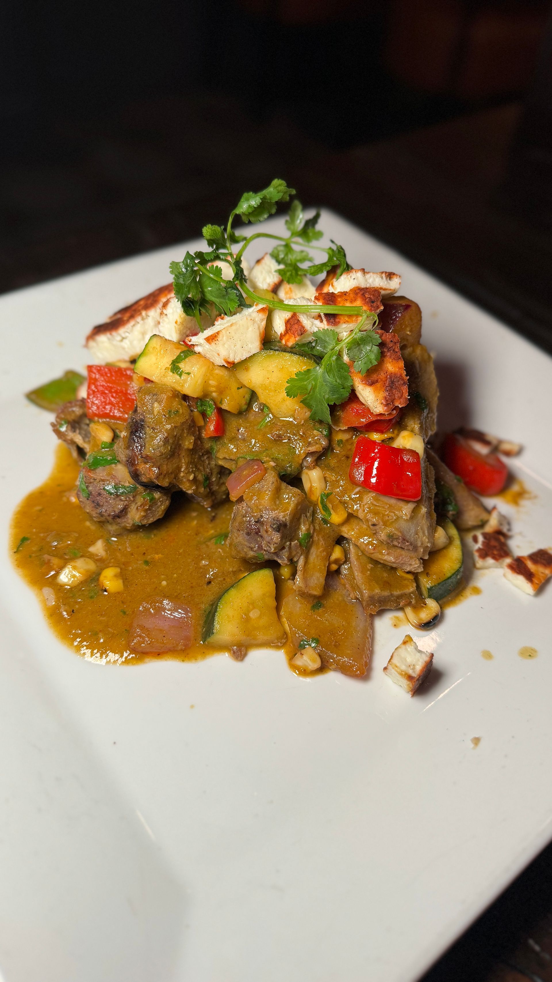 A close up of a plate of food on a table.
