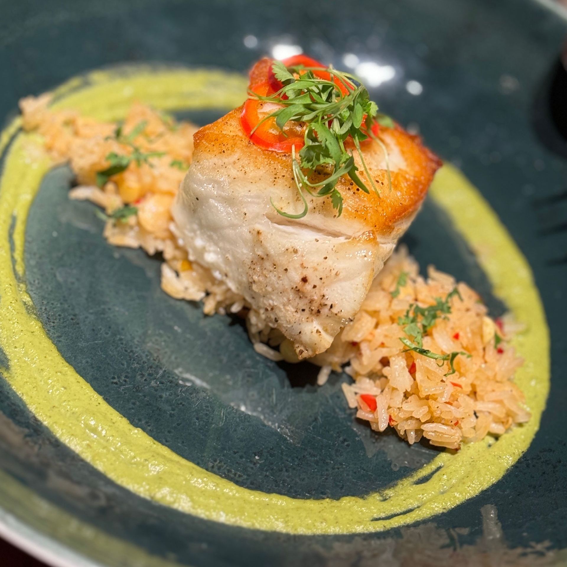 A close up of a plate of food on a table